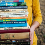 women holding books