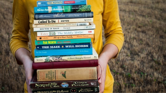 women holding books